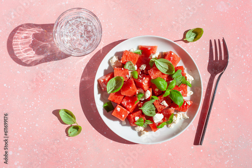 watermelon salad with feta cheese and basil. healthy summer dessert