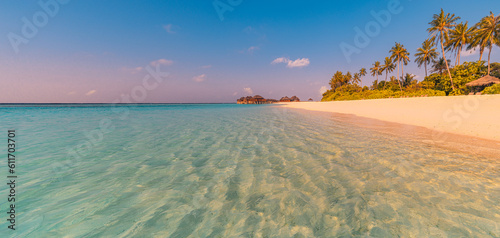 Fototapeta Naklejka Na Ścianę i Meble -  Beautiful beach, palm trees white sand sunny blue sky. Best summer vacation travel landscape. Maldives paradise beach. Luxury holiday background. Bright relax sea water, exotic resort paradise island