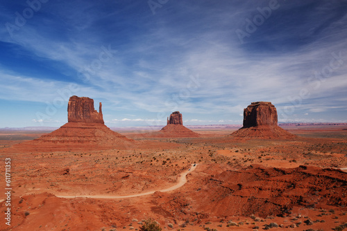 Amazing red rock formations in the Monument Valley  Navajo Tribal Park  Utah  USA. Dry landscape and dramatic clouds.