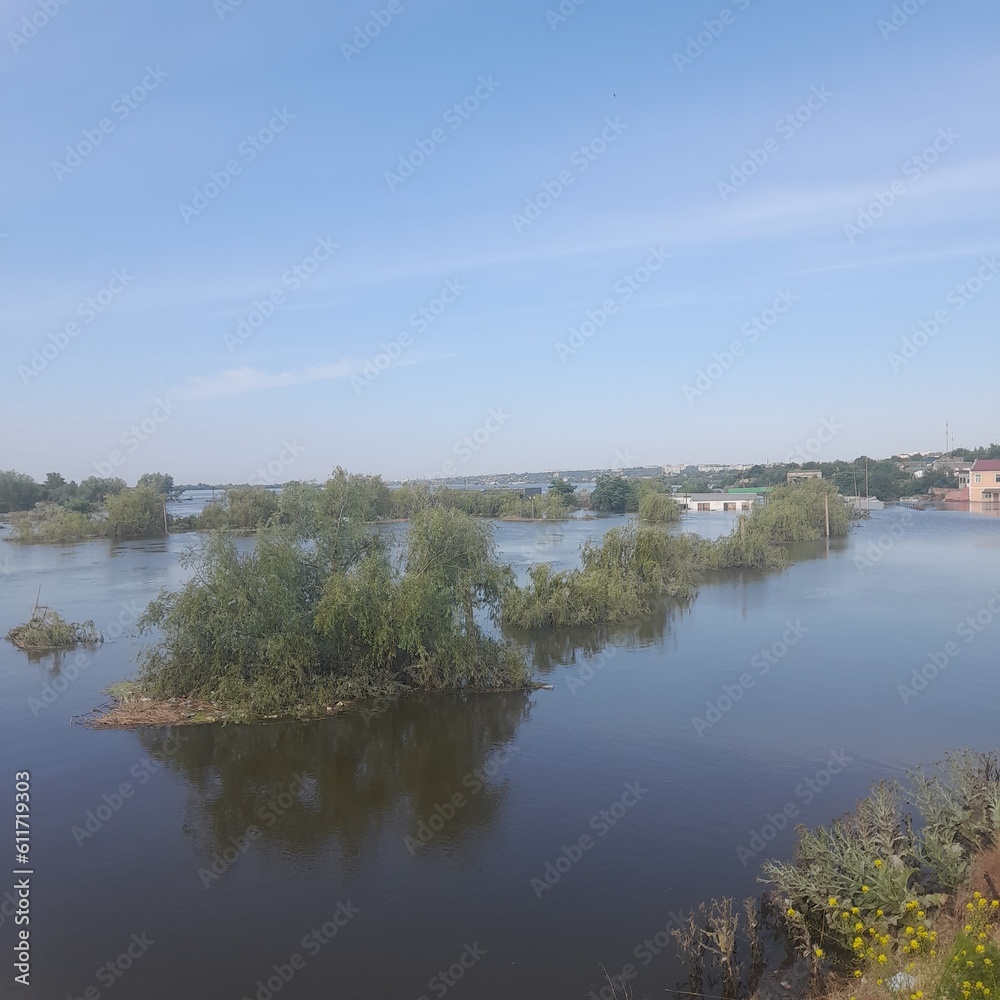 A photo of the flooded bank after the tragedy at the dam on the Kakhovsky Reservoir