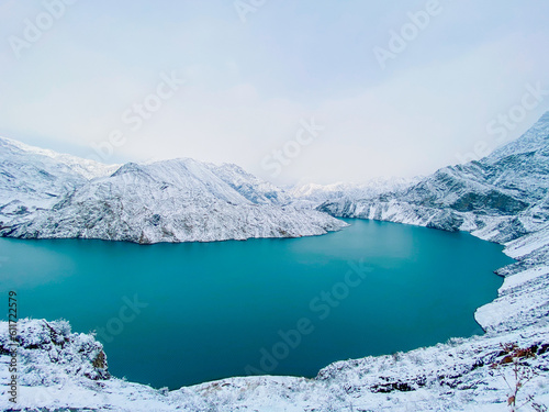 Snowy mountains and lake during winter