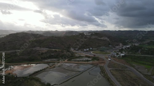 Drone shot of highway in Lombok, Indonesia near Tanjung Aan beach and Gerupuk village photo