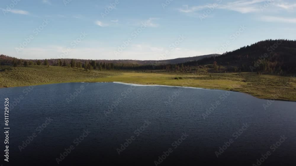 Frenchmans Lake California drone flight over the water to shore on a sunny day. Frenchmans Lake California drone flight over the water to shore on a sunny day.