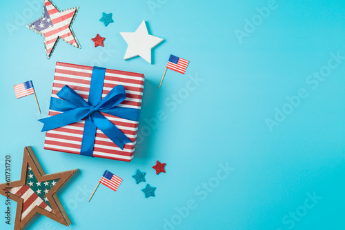 Happy Independence Day, 4th of July background with gift box, stars and USA flag. Top view, flat lay