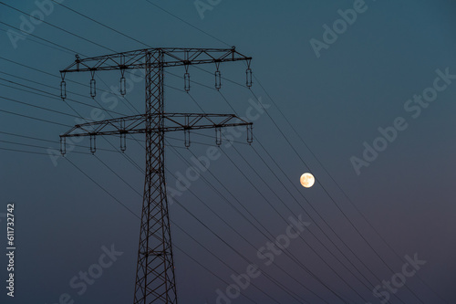 Photography power lines with moon