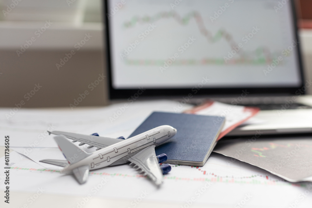 Investing in an airline. Airplane on background of green graphics. Waste cost airlines. Splash in stock prices. Concept - new investments have led to stock prices. Airplane as a symbol of air travel Investing in an airline. Airplane on background of green graphics. Waste cost airlines. Splash in stock prices. Concept - new investments have led to stock prices. Airplane as a symbol of air travel