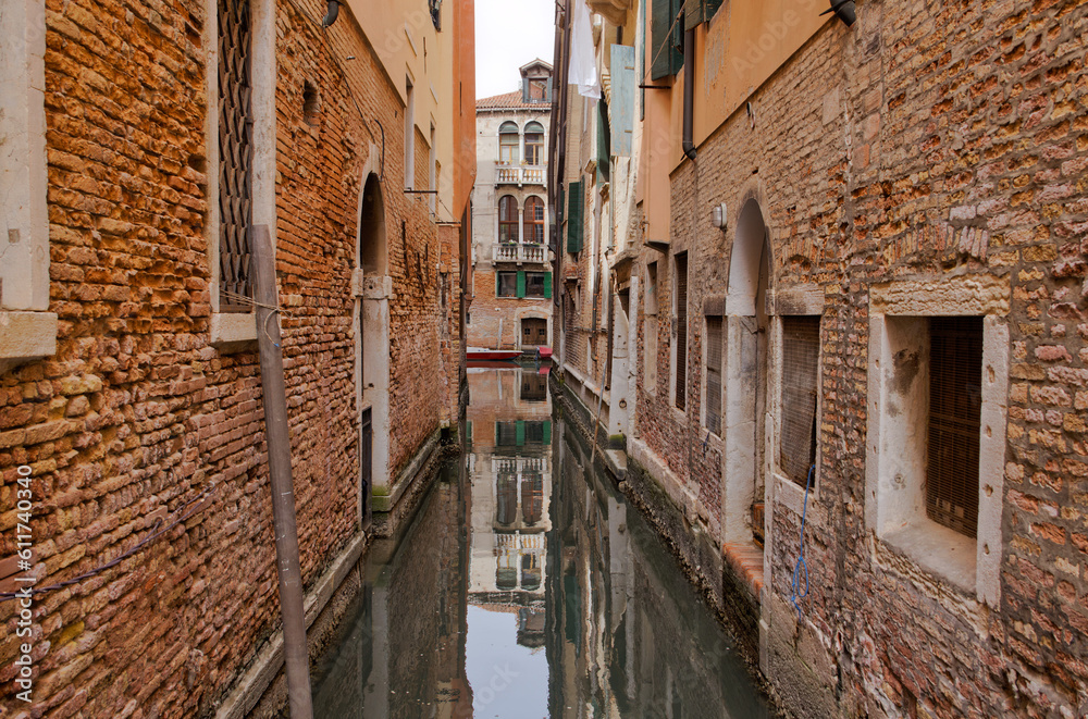 Intimate Canal View Amidst Venice's Residential Walls