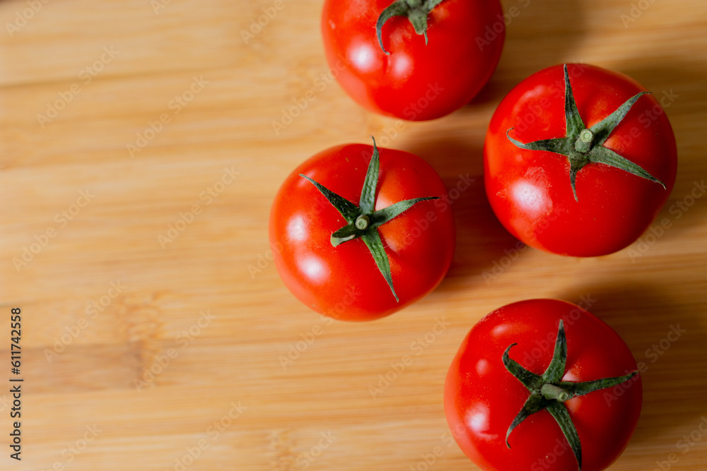 tomatoes back ground healthy food over a wood plate tomatoes back ground healthy food over a wood plate