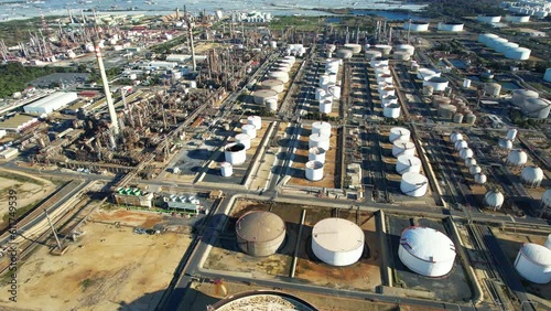 Aerial fly over above oil refinery on the coast of the Atlantic photo