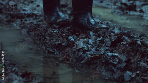 Walking through a mud in rubber boots on a forest road. High quality binaural audio recording. ASMR style video and sound.
