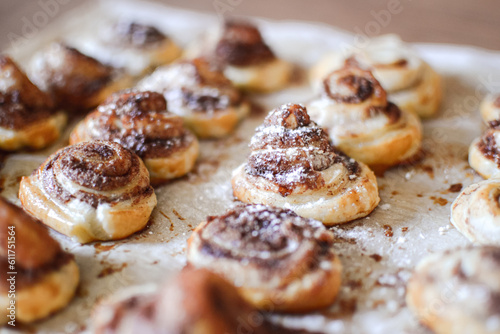 freshly baked cinnamon rolls with powder sugar 