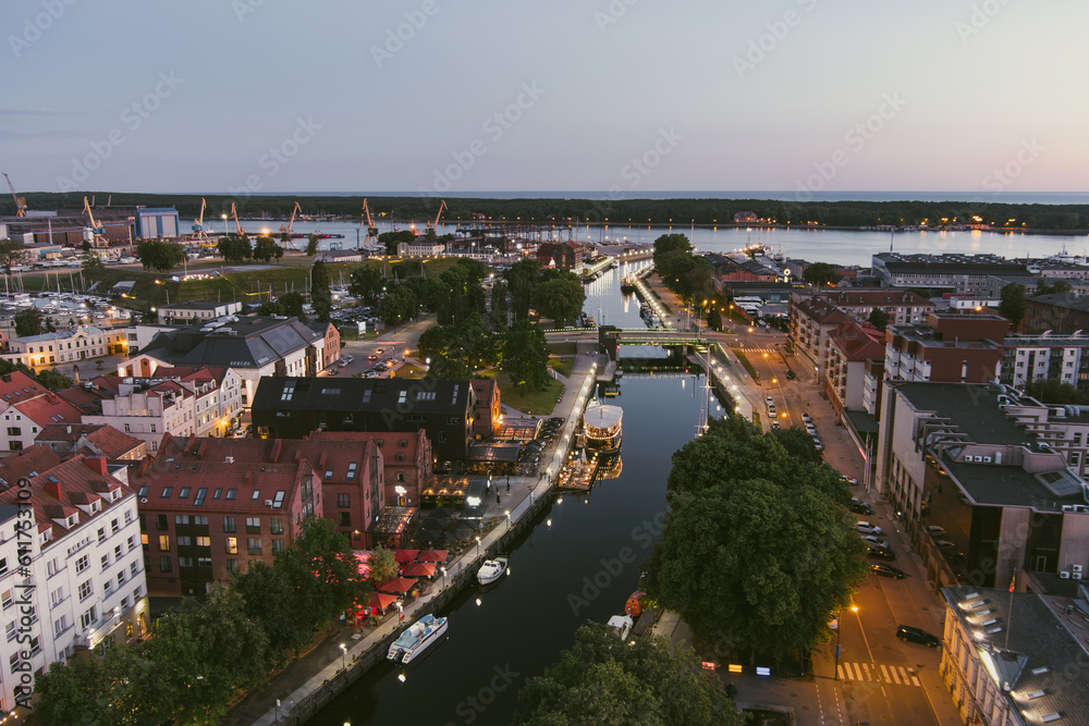 Scenic aerial view of the Old town of Klaipeda, Lithuania in evening light. Klaipeda city port area and it's surroundings on summer day.