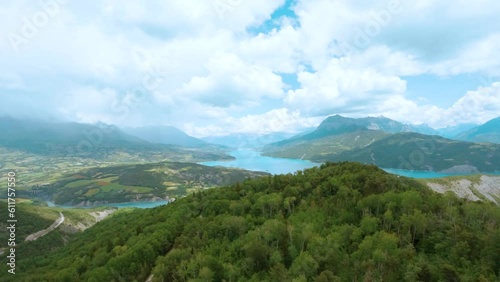 Lake in the mountains. Aerial image of the Lac de Savine in the Hautes-Alpes which is the largest artificial lake in Europe. photo