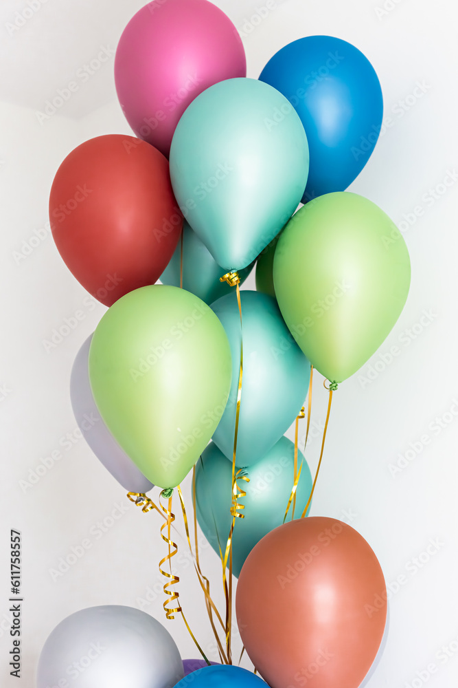 Multicolored balloons. Bunch of bright balloons and space for text against white background.