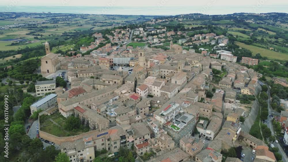 italy, june 2023 - aerial view of the medieval village of Potenza Picena in the province of Macerata in the Marche region. From the town you can see Mount Conero and the Adriatic Sea in the background italy, june 2023 - aerial view of the medieval village of Potenza Picena in the province of Macerata in the Marche region. From the town you can see Mount Conero and the Adriatic Sea in the background
