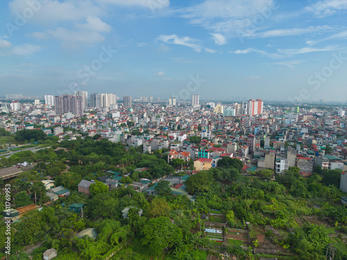 Aerial view of Hanoi Downtown Skyline, Vietnam. Financial district and business centers in smart urban city in Asia. Skyscraper and high-rise buildings. © tampatra