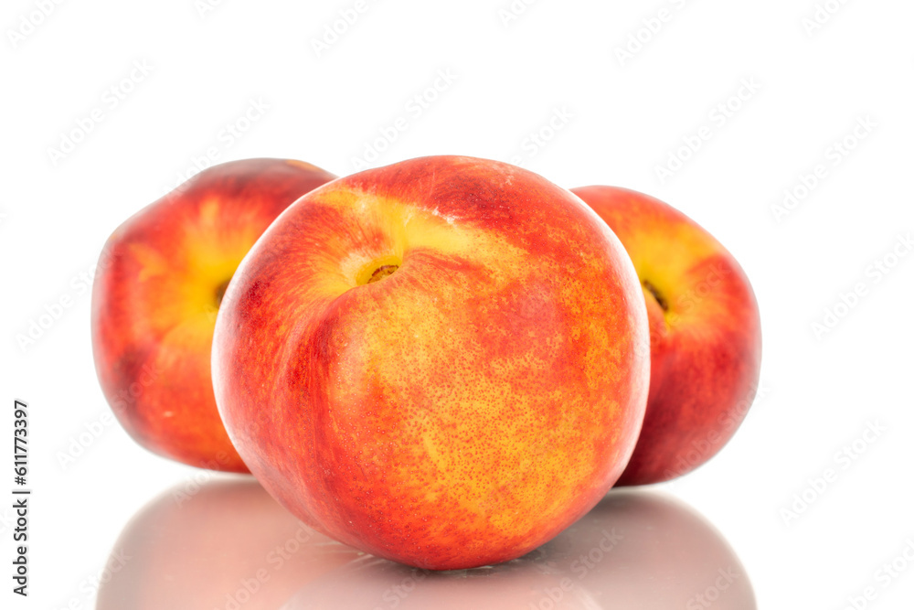 Three sweet nectarines, macro, isolated on white background. Three sweet nectarines, macro, isolated on white background.