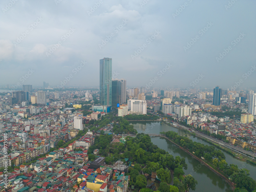 Aerial view of Hanoi Downtown Skyline with green garden park, Vietnam. Financial district and business centers in smart urban city in Asia. Skyscraper and high-rise buildings.