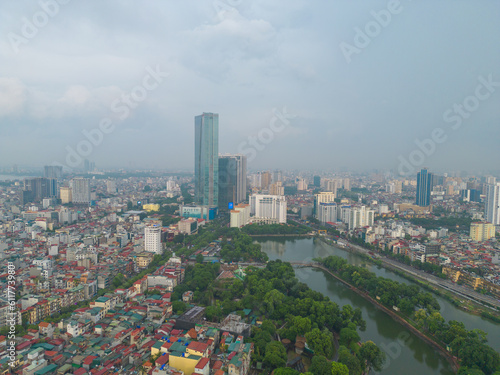 Aerial view of Hanoi Downtown Skyline with green garden park, Vietnam. Financial district and business centers in smart urban city in Asia. Skyscraper and high-rise buildings.