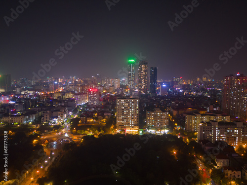 Aerial view of Hanoi Downtown Skyline, Vietnam. Financial district and business centers in smart urban city in Asia. Skyscraper and high-rise buildings at night.