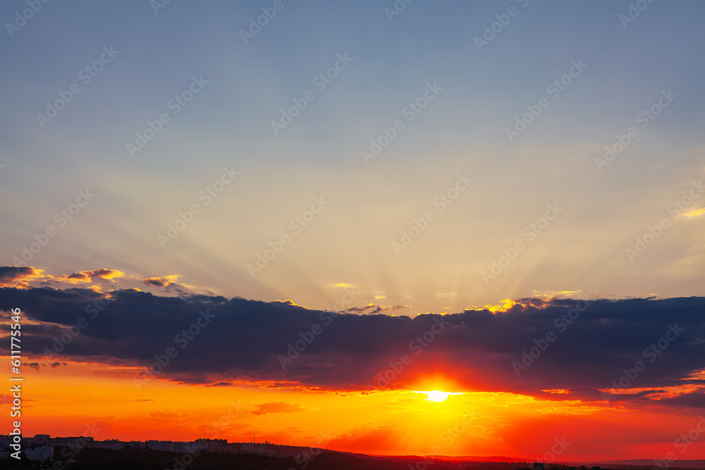 Sunset on horizon over the city . Beautiful twilight in the city 