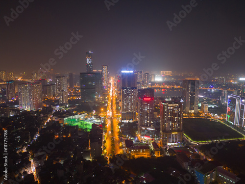 Aerial view of Hanoi Downtown Skyline, Vietnam. Financial district and business centers in smart urban city in Asia. Skyscraper and high-rise buildings at night.