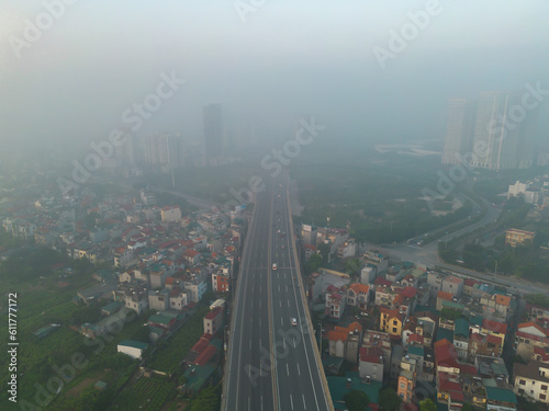 Aerial view of Hanoi Downtown Skyline with fog mist  Vietnam. Financial district and business centers in smart urban city in Asia. Skyscraper and high-rise buildings.
