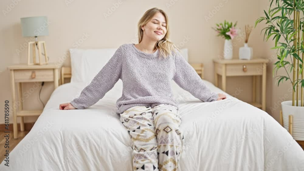Young blonde woman smiling confident lying on bed at bedroom Young blonde woman smiling confident lying on bed at bedroom