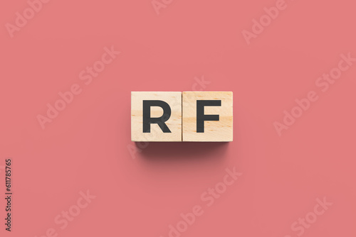 RF (Rheumatic Fever) wooden cubes on red background photo