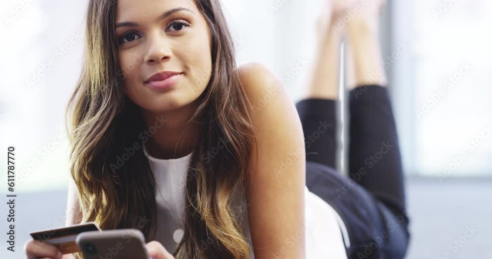 Phone, online shopping and face of woman with credit card on bed for purchase, payment and banking. Ecommerce, bedroom and portrait of female person on smartphone for mobile app, internet and fintech Phone, online shopping and face of woman with credit card on bed for purchase, payment and banking. Ecommerce, bedroom and portrait of female person on smartphone for mobile app, internet and fintech
