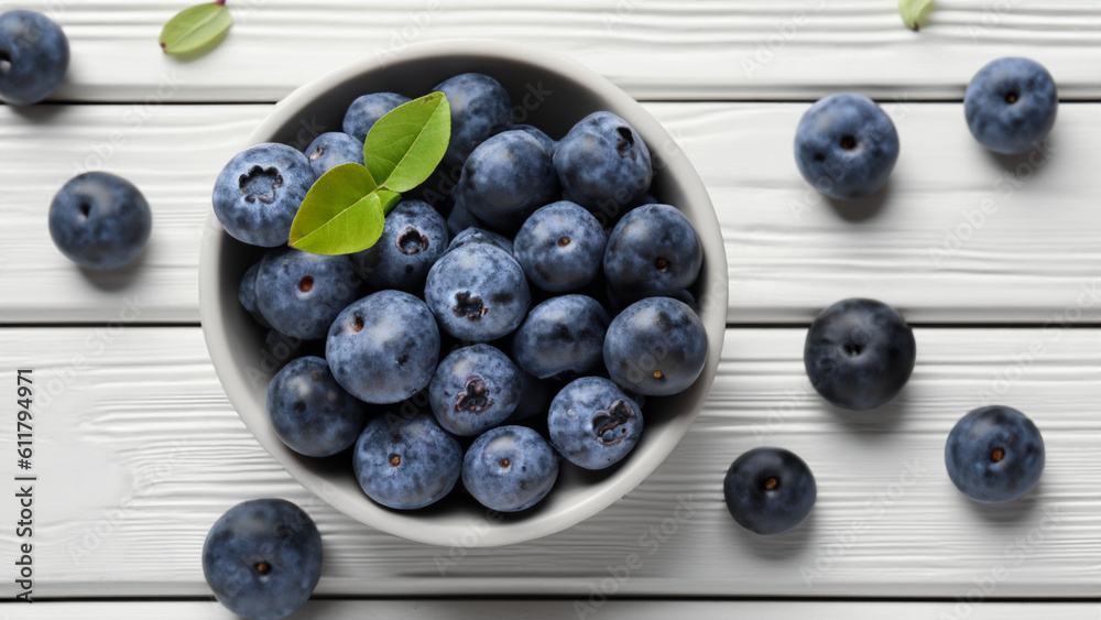 Fresh ripe blueberries with leaves in bowl on white wooden planks - generative ai Fresh ripe blueberries with leaves in bowl on white wooden planks - generative ai