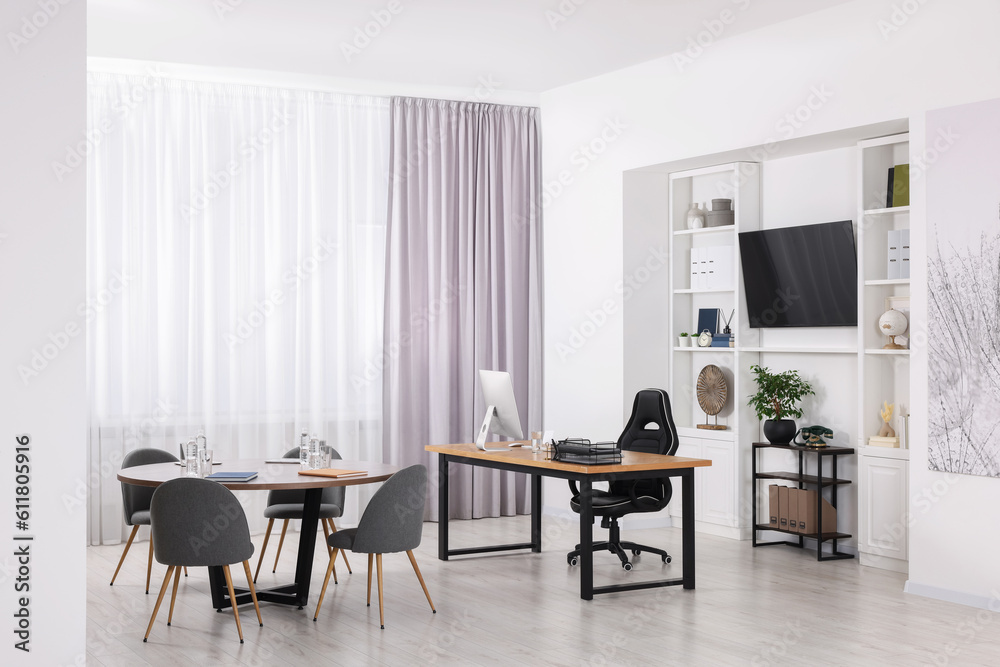Stylish office with comfortable furniture and tv zone. Interior design Stylish office with comfortable furniture and tv zone. Interior design