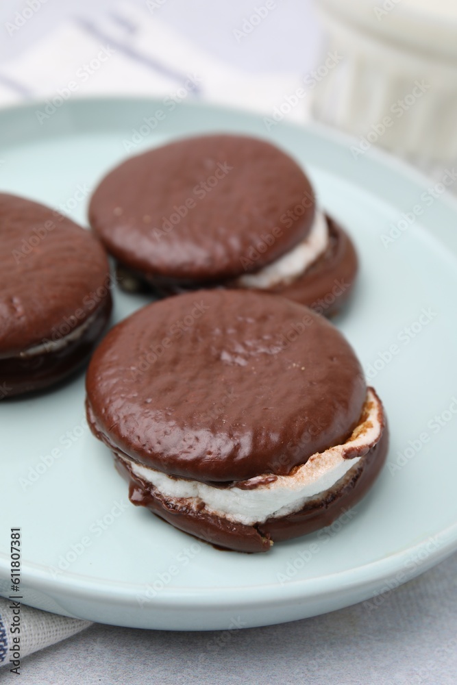 Tasty sweet choco pies on table, closeup Tasty sweet choco pies on table, closeup