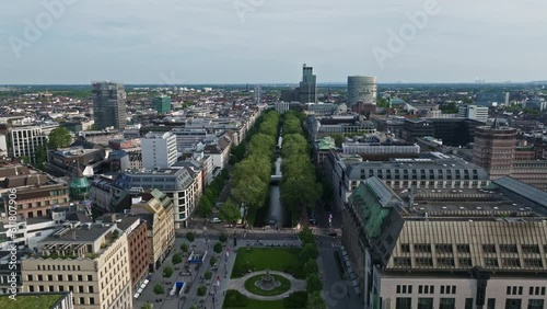 Drone shot of The Königsallee (King's Avenue), it is an urban boulevard in Düsseldorf, state capital of North Rhine-Westphalia, Germany.   photo