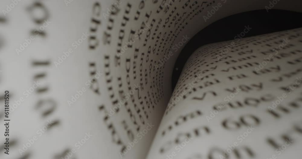 Fast moving macro shot viewed text inside book. Book sheets close-up with text english. Macro view shot moves between the pages of the book. Text english. Dolly shot open book against black background