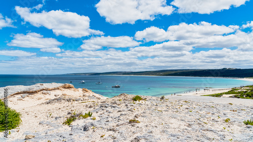 Hamelin Bay  a vast expanse of bright white sand  turquoise waters filled with marine life  and spectacular coastal cliff walks.