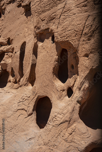 holes in a desert mountain (ID: 611818540)