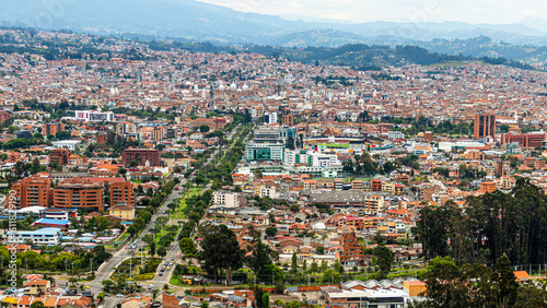 Fototapeta Naklejka Na Ścianę i Meble -  Panoramic top view of the city of Cuenca, located in the valley, from the observation deck of Turi, Ecuador
