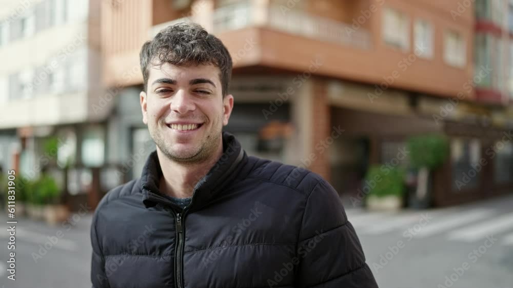 Young hispanic man smiling confident at street Young hispanic man smiling confident at street