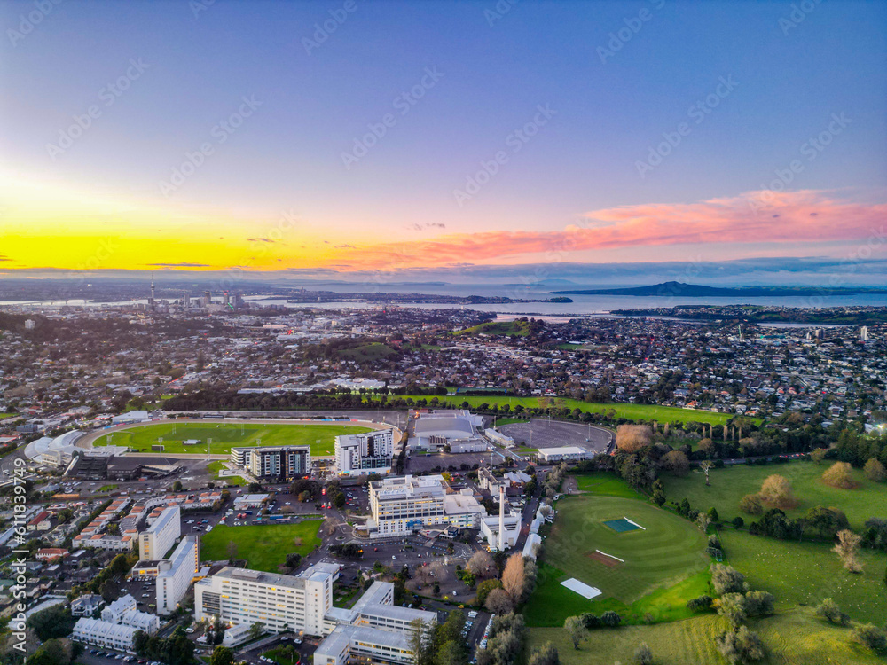 Sports fields and hospital in Auckland at sunset