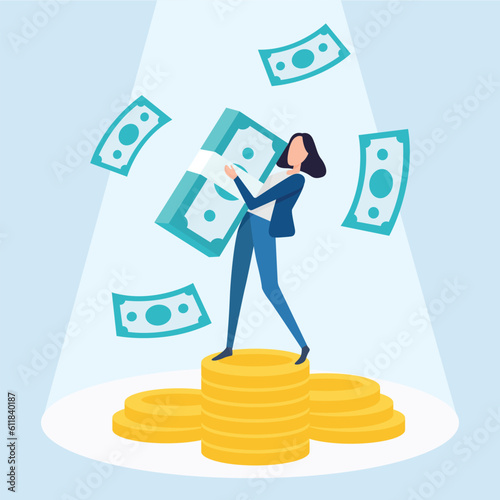 Woman holding big money and standing on gold coins, concept Rich from the jackpot