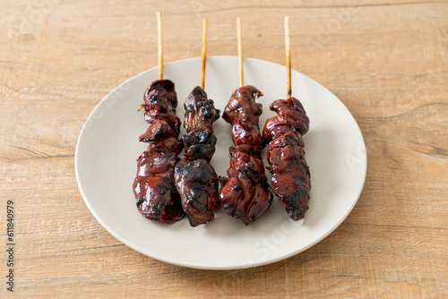 grilled chicken liver skewer yakitori serve in izakaya style photo