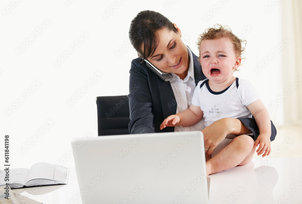 Woman, home office and phone call with kid, laptop and care with talk, reading and multitasking at desk. Mother, baby boy and cellphone for networking, crying and remote work at pc in family house