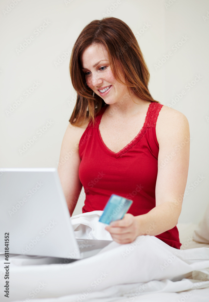 Laptop, bed and woman with credit card for online shopping, payment or digital banking in home. Ecommerce, bedroom and happy person on computer for finance, internet sales on web store and fintech. Laptop, bed and woman with credit card for online shopping, payment or digital banking in home. Ecommerce, bedroom and happy person on computer for finance, internet sales on web store and fintech.