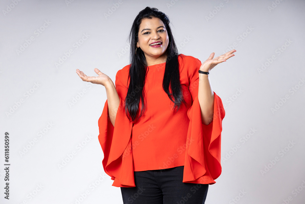 Indian woman smiling and giving happy expression. Indian woman smiling and giving happy expression.