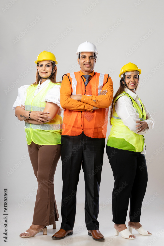 Indian engineer group standing together on white background Indian engineer group standing together on white background