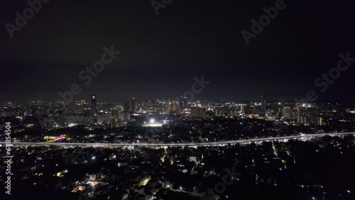 Wallpaper Mural aerial drone shot flying over the cityscape of gurgaon with houses and skyscrapers with homes offices towards elevated sohna road express highway joining delhi to mumbai Torontodigital.ca