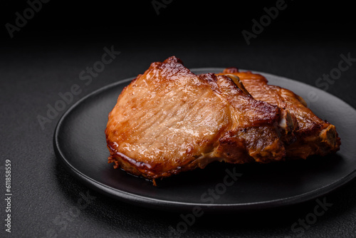 Delicious juicy pork or beef steak with salt, spices and herbs