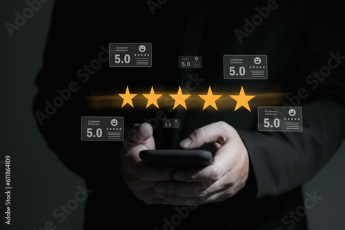 customer experience concept Best service for satisfaction, customers give five-star ratings through their smartphones.