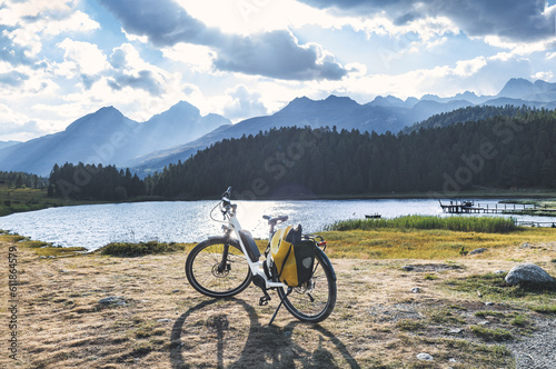 A bicycle near an alpine lake
